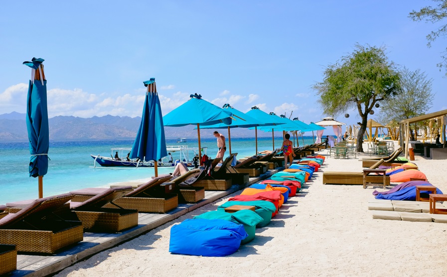 sunbathing on the beach of gilis