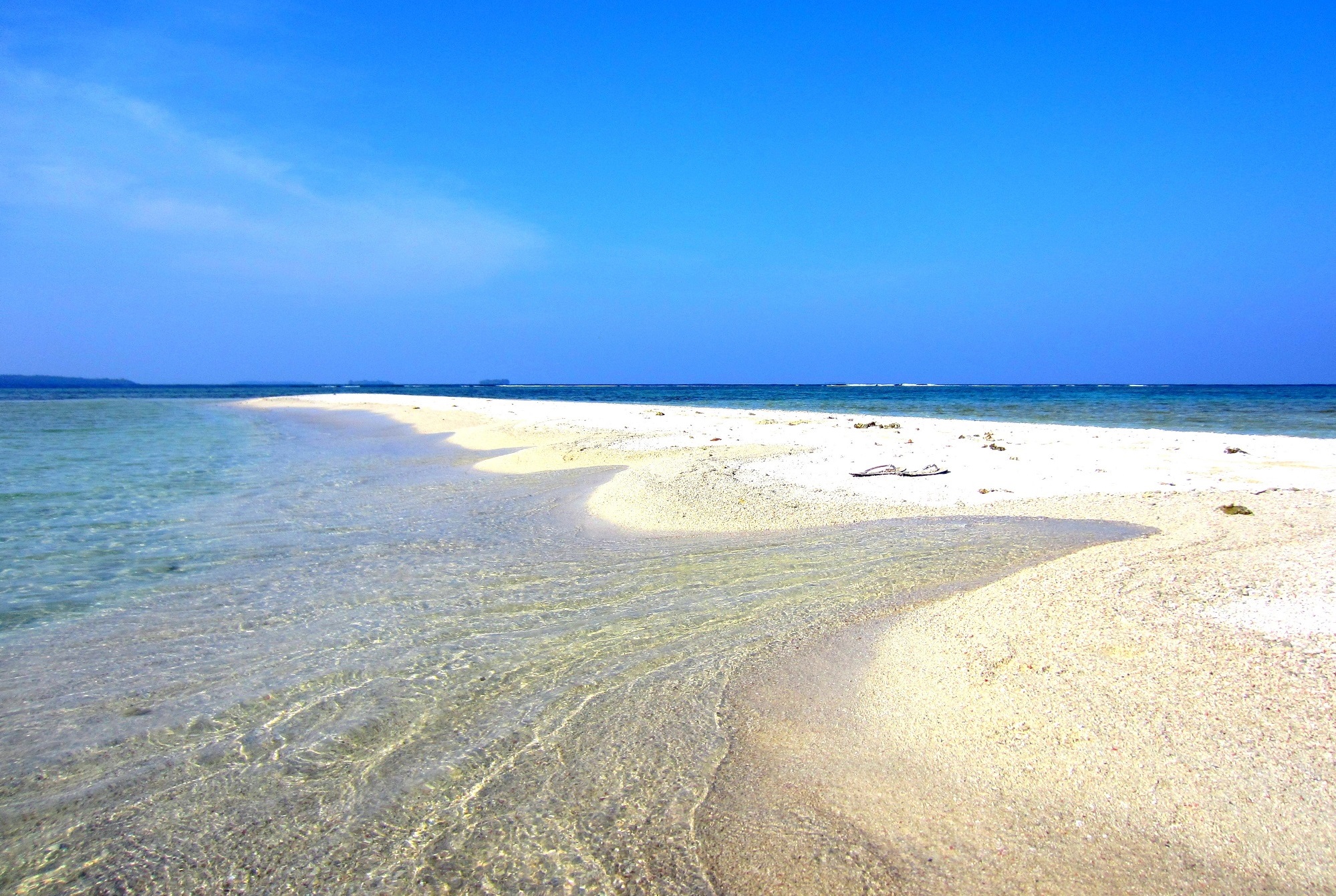 Setting foot on a tiny sand island karimunjawa